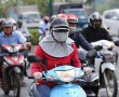Bật đèn xe máy ban ngày, tranh cãi chưa hồi kết